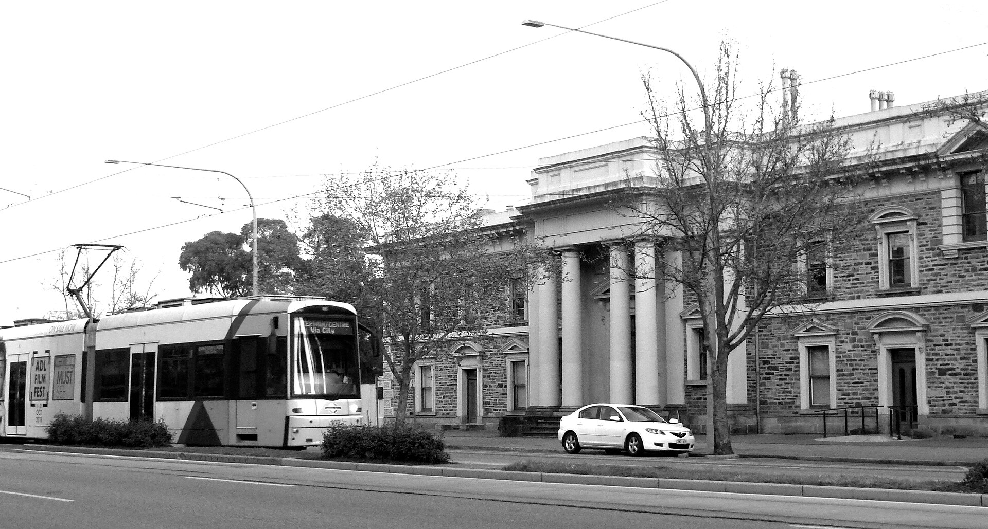File:Bombardier Flexity tram from Glenelg passes SA Supreme Court, King William Street bw.jpg