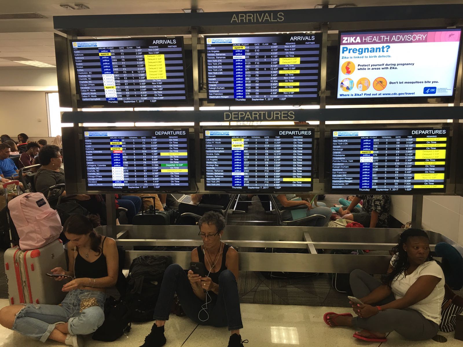 File:Travelers waiting at the Fort Lauderdale airport.jpg