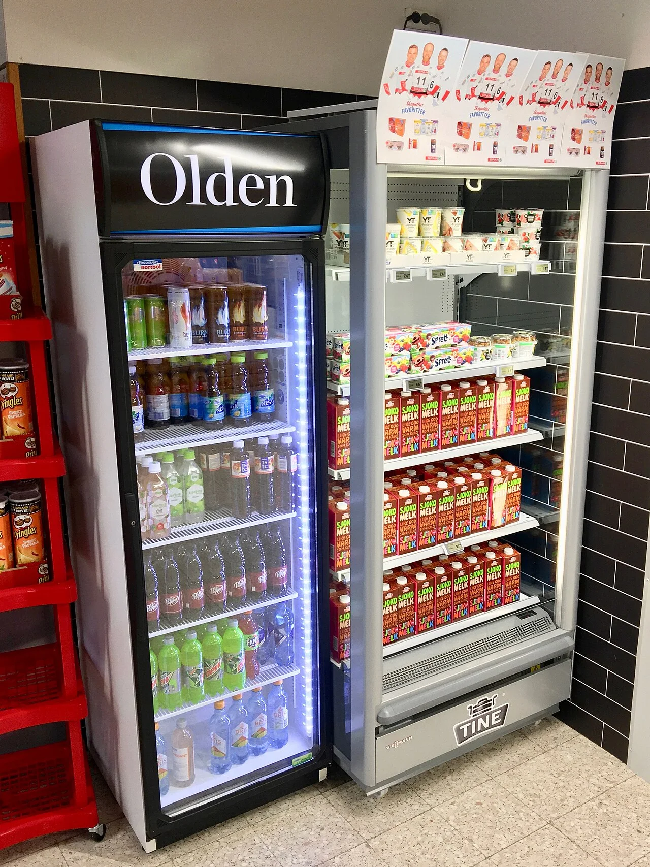 Related file image: Misc. soft drinks (Dr. Pepper, Ice tea, Burn, etc.) and milk products (Sjokomelk etc.) in Olden and Tine glass door refrigerators chillers showcases in SPAR Supermarket in Fusa, Hordaland, Norway 2018-03-21 B