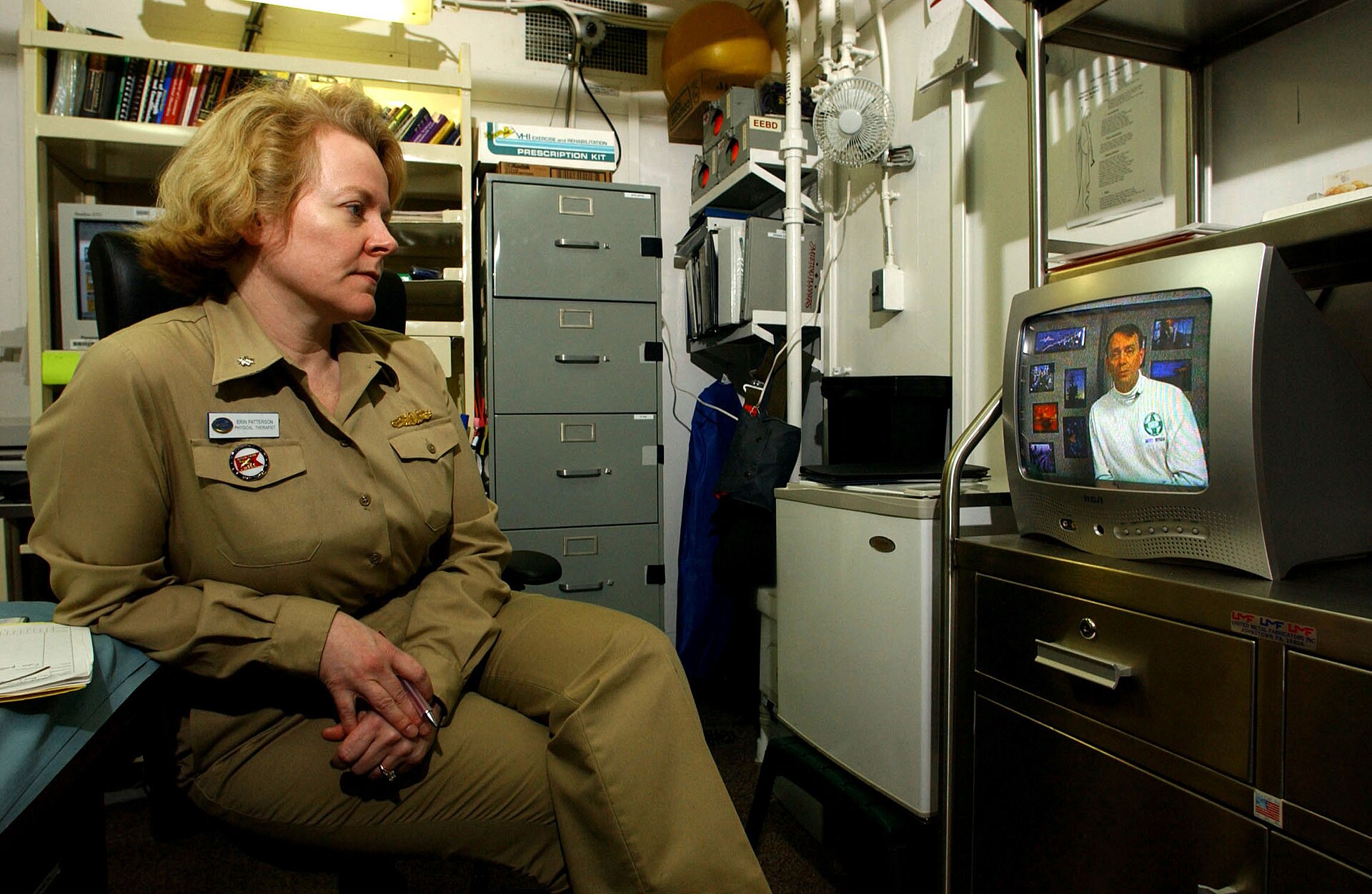 File:US Navy 030316-N-4308O-015 Cdr. Erin Patterson, Medical Officer aboard USS Harry S. Truman (CVN 75), watches a 'safety stand-down video' in her office.jpg
